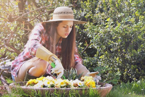 Seasonal garden care by a Kidbrooke gardener in a modern outdoor space